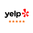 Yelp logo with five gold stars rating for Serenity Dental business review